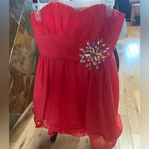 Coral pink strapless dress with gem detail